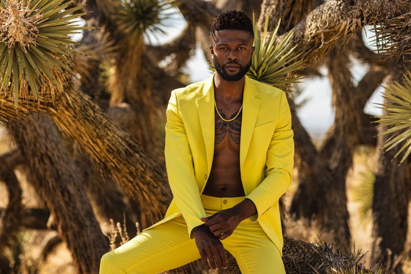 Alonzo B.Slater, actor and model in the California Desert wearing a yellow suit