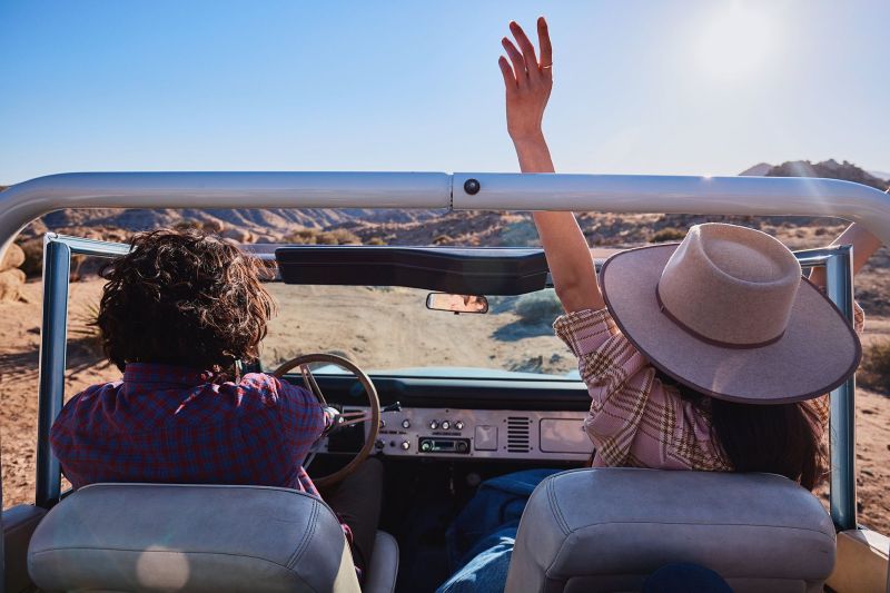 Driving a vintage Ford Bronco in the desert for two friends. Lifestyle photography for an outdoor assignment