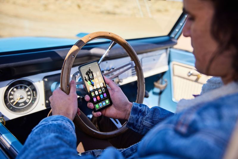 Outdoor clean energy campaign for Nacero. Ford Bronco and model playing with his phone