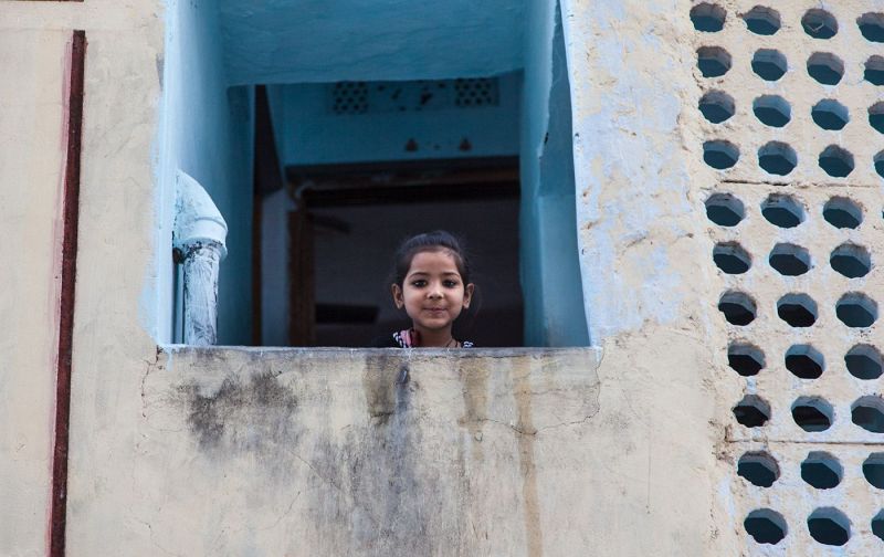 Girl at the window in Jodhpur, Rajasthan. India